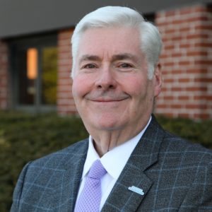 Richard T. Margulis, president and CEO of Long Island Community Hospital, poses for a portrait in front of the hospital in Patchogue Monday, March 22, 2021.